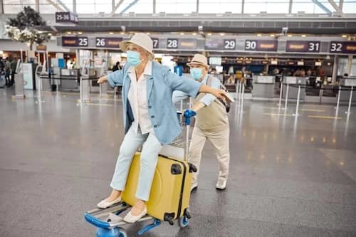 Elderly people being assisted at the airport