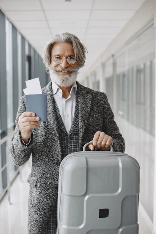 Man with passport and luggage
